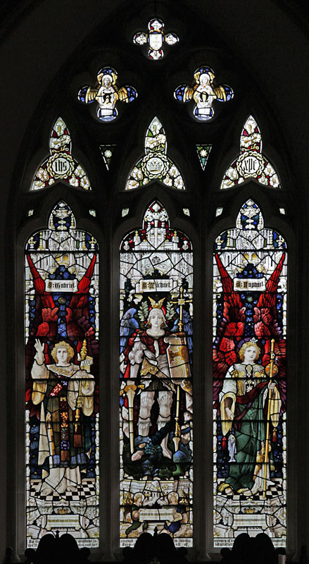 Stained glass window by Percy Bacon and Borthers depicting Archangels Gabriel, Michael & Raphael, & St Michael: 
All Angels, Marwood, Devon, 1910